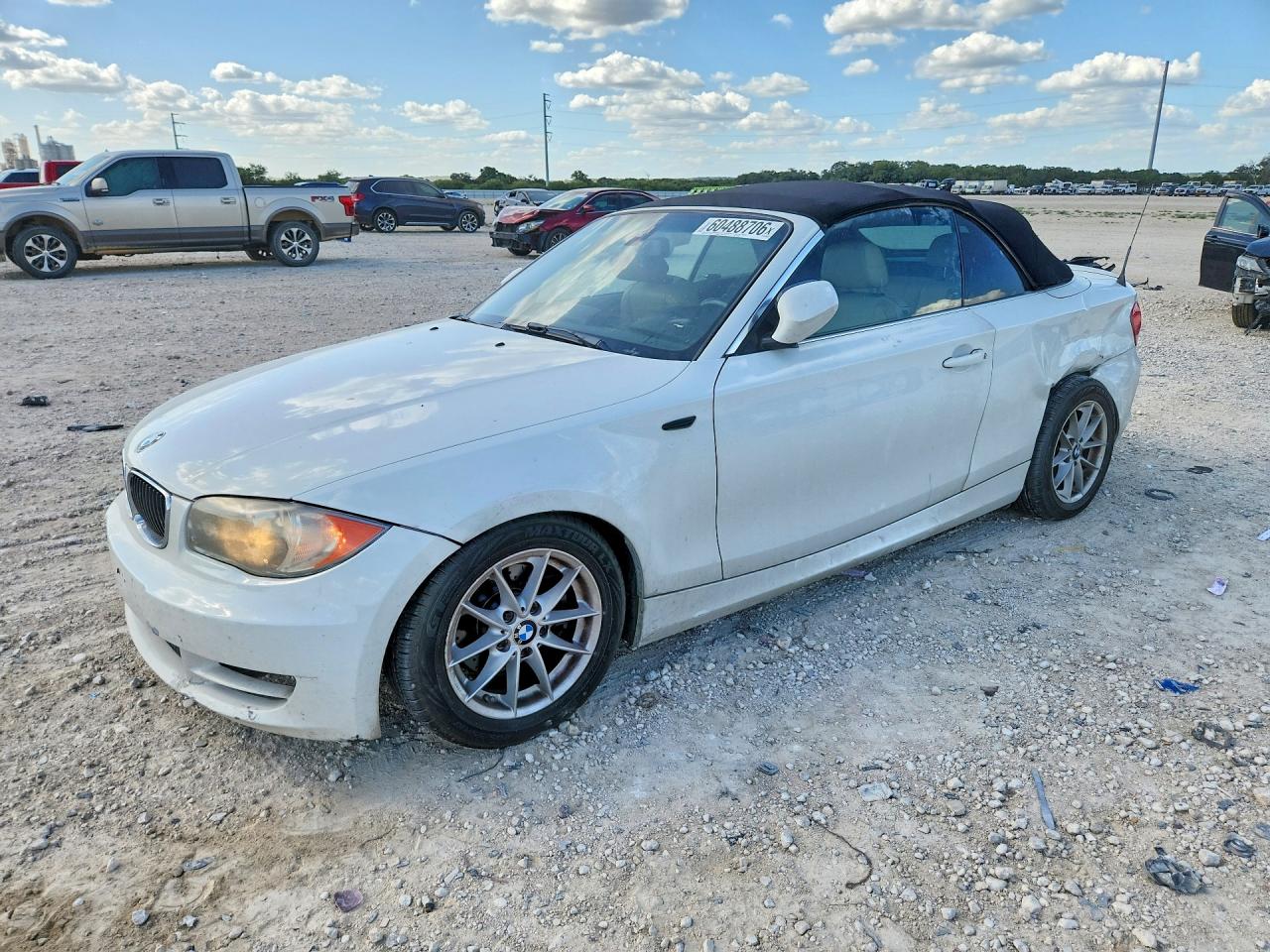 2010 BMW 1 Series 128i, VIN WBAUN1C54AVH81819 — Side
