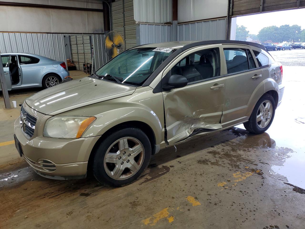 2009 Dodge Caliber SXT, VIN 1B3HB48A99D123367 — Бок