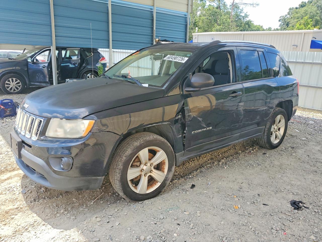 2012 Jeep Compass Sport, VIN 1C4NJCBB9CD724642 — Side