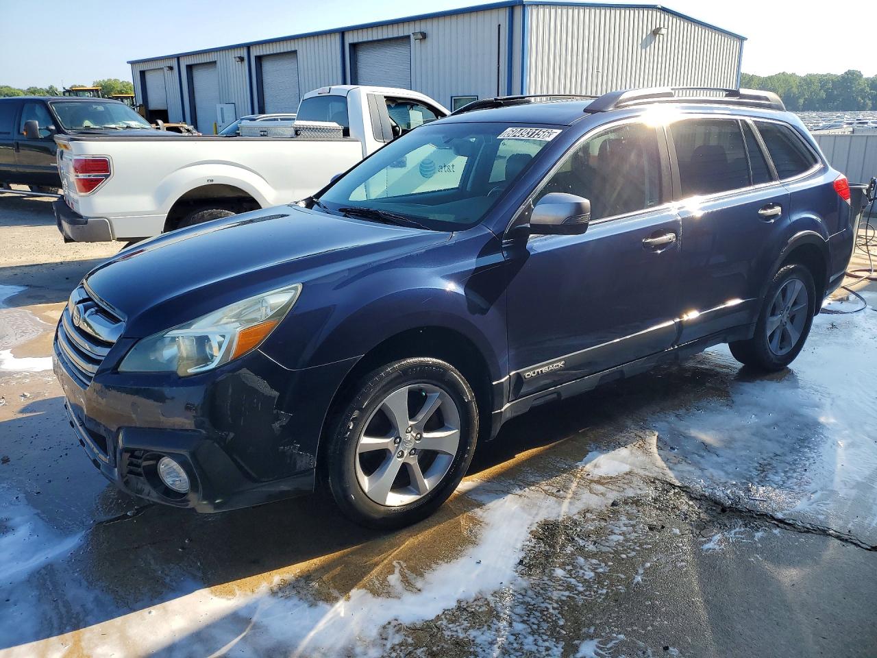 2014 Subaru Outback Limited, VIN 4S4BRDPC9E2281406 — Minor dents and scratches