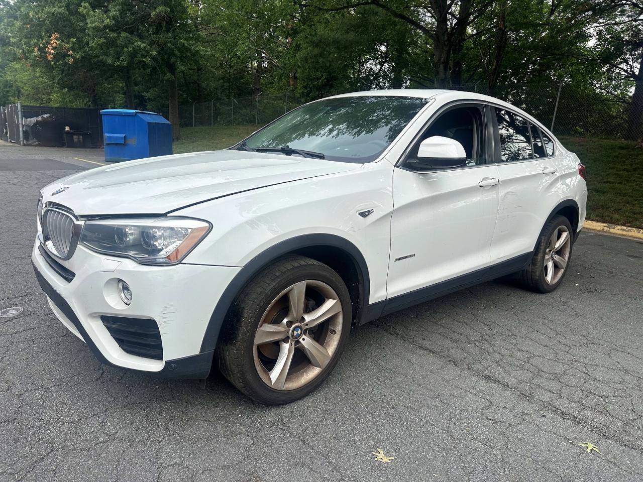 2016 BMW X4 xDrive28i, VIN 5UXXW3C51G0M89913 — Бок