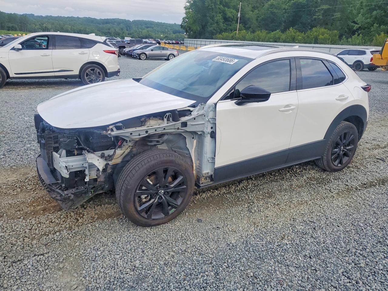 2023 Mazda CX-30 Premium Plus, VIN 3MVDMBEY5PM574180 — Front end