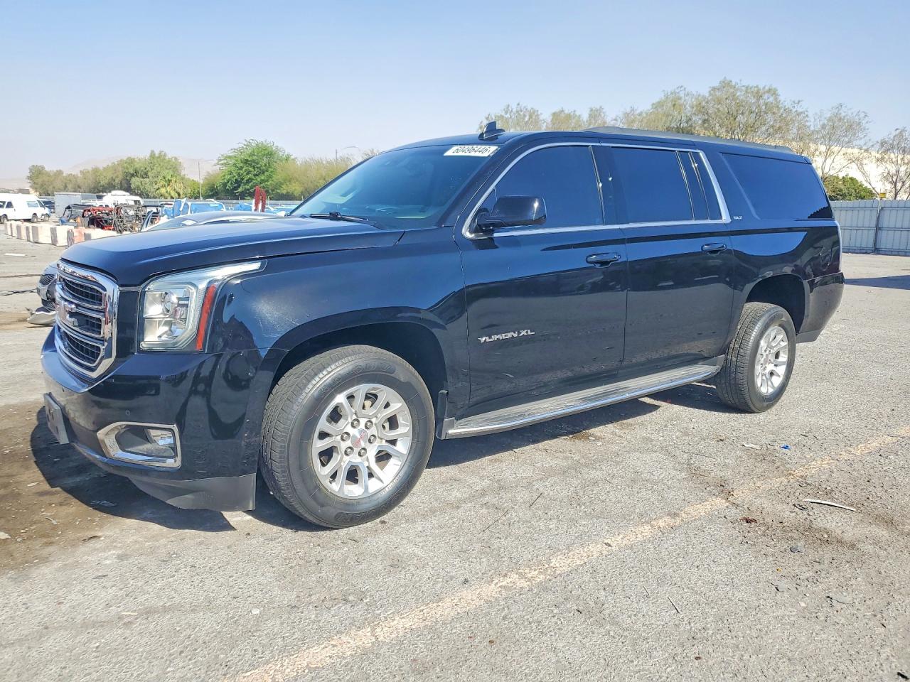 2016 GMC Yukon XL SLT, VIN 1GKS1GKC6GR233171 — Rear end