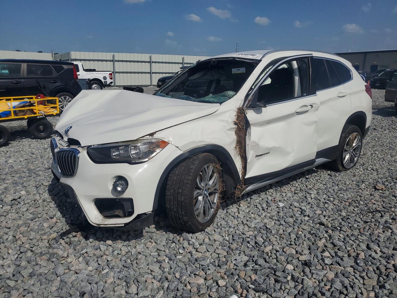 2017 BMW X1 xDrive28i, VIN WBXHT3C36H5F73989 — Rollover