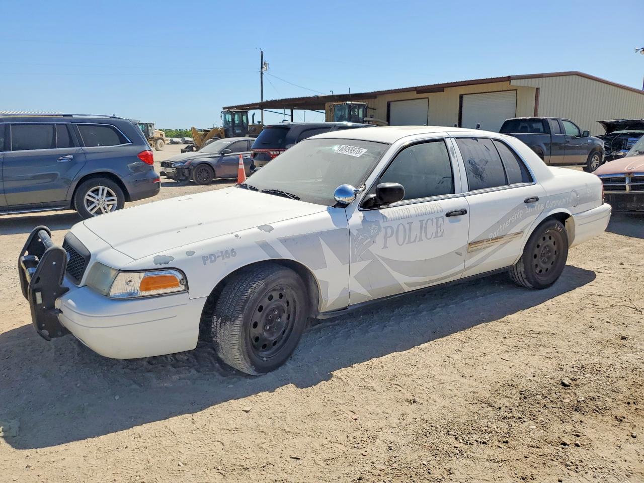 2011 Ford Police Interceptor, VIN 2FABP7BV6BX108820 — Side