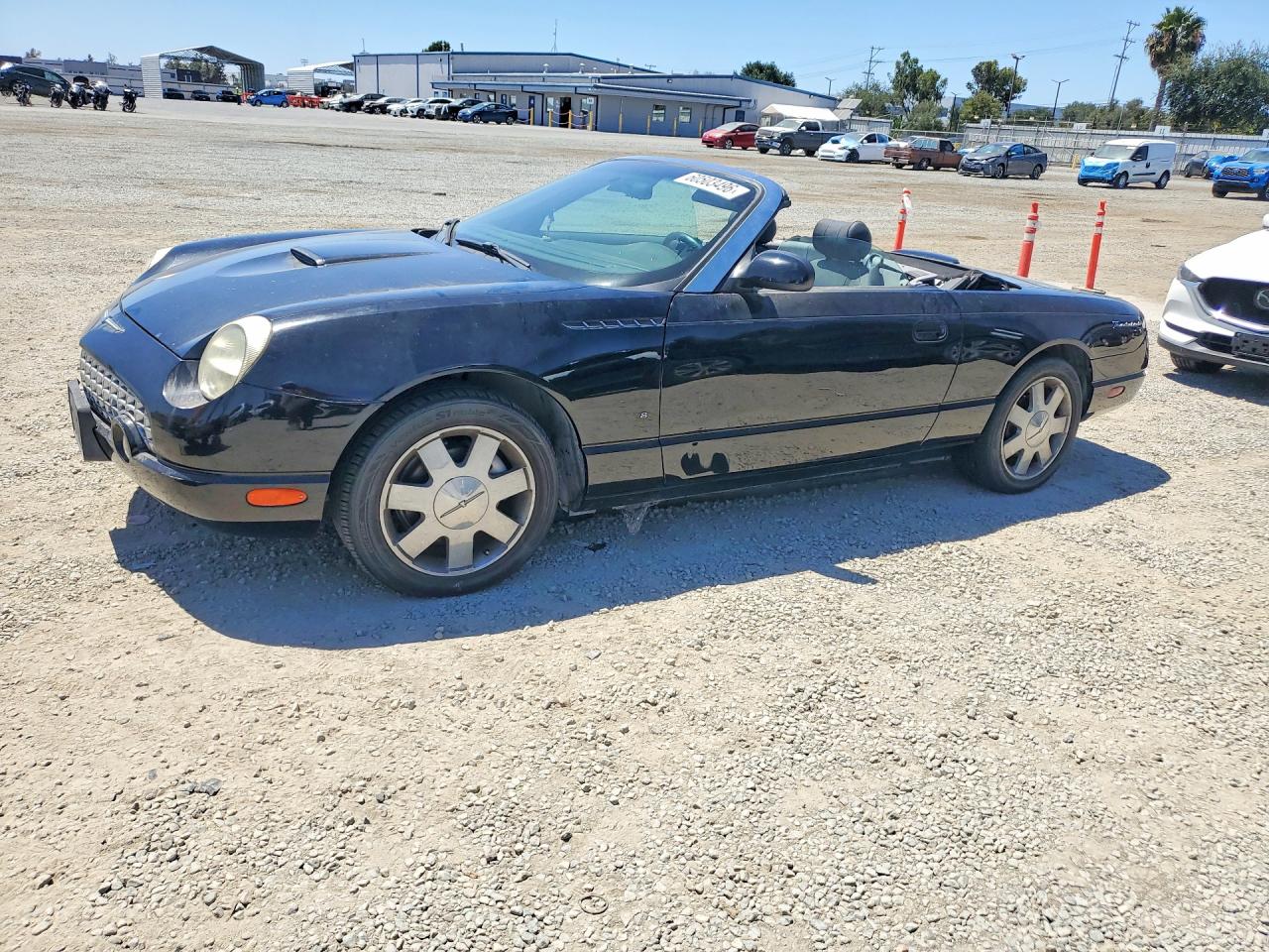 2003 Ford Thunderbird Deluxe, VIN 1FAHP60A63Y112159 — Side