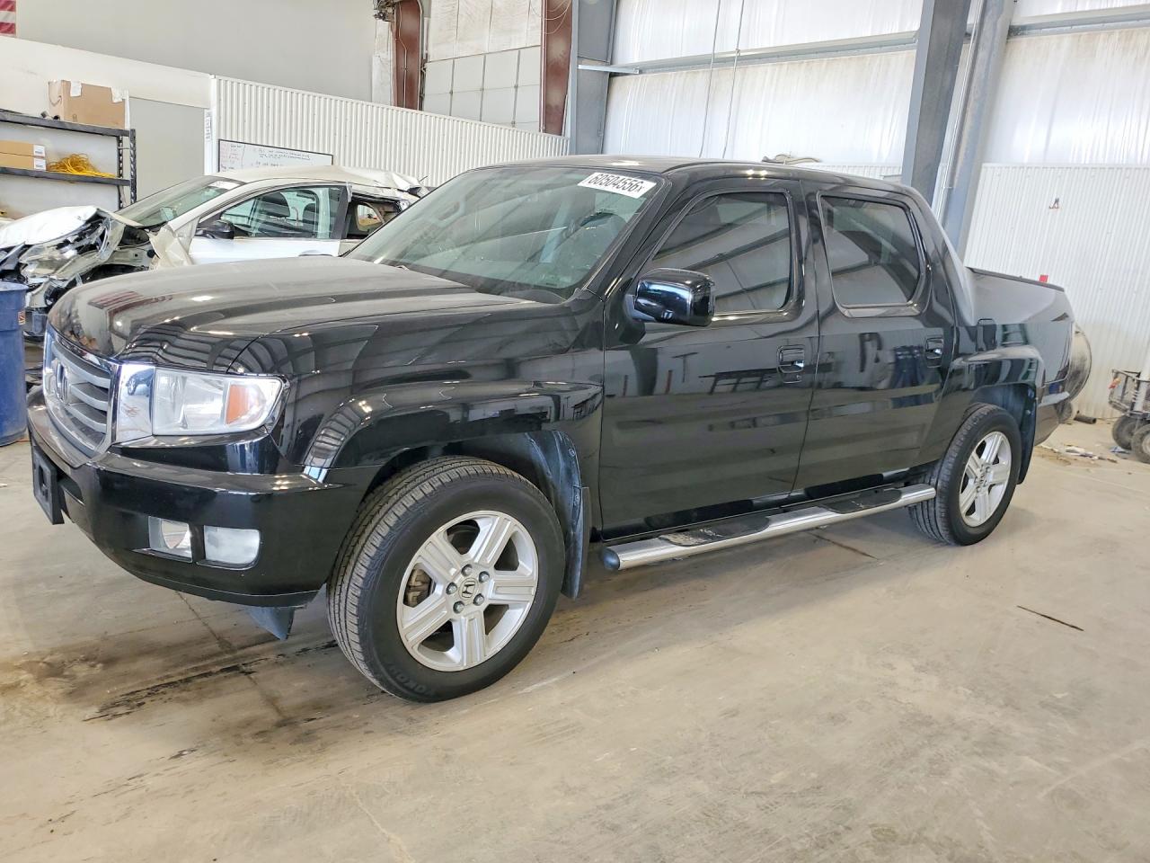 2013 Honda Ridgeline RTL, VIN 5FPYK1F56DB016918 — Rear end