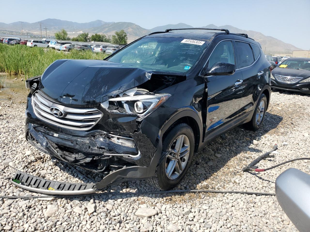 2017 Hyundai Santa Fe 2.4L, VIN 5NMZUDLB7HH041284 — Front end