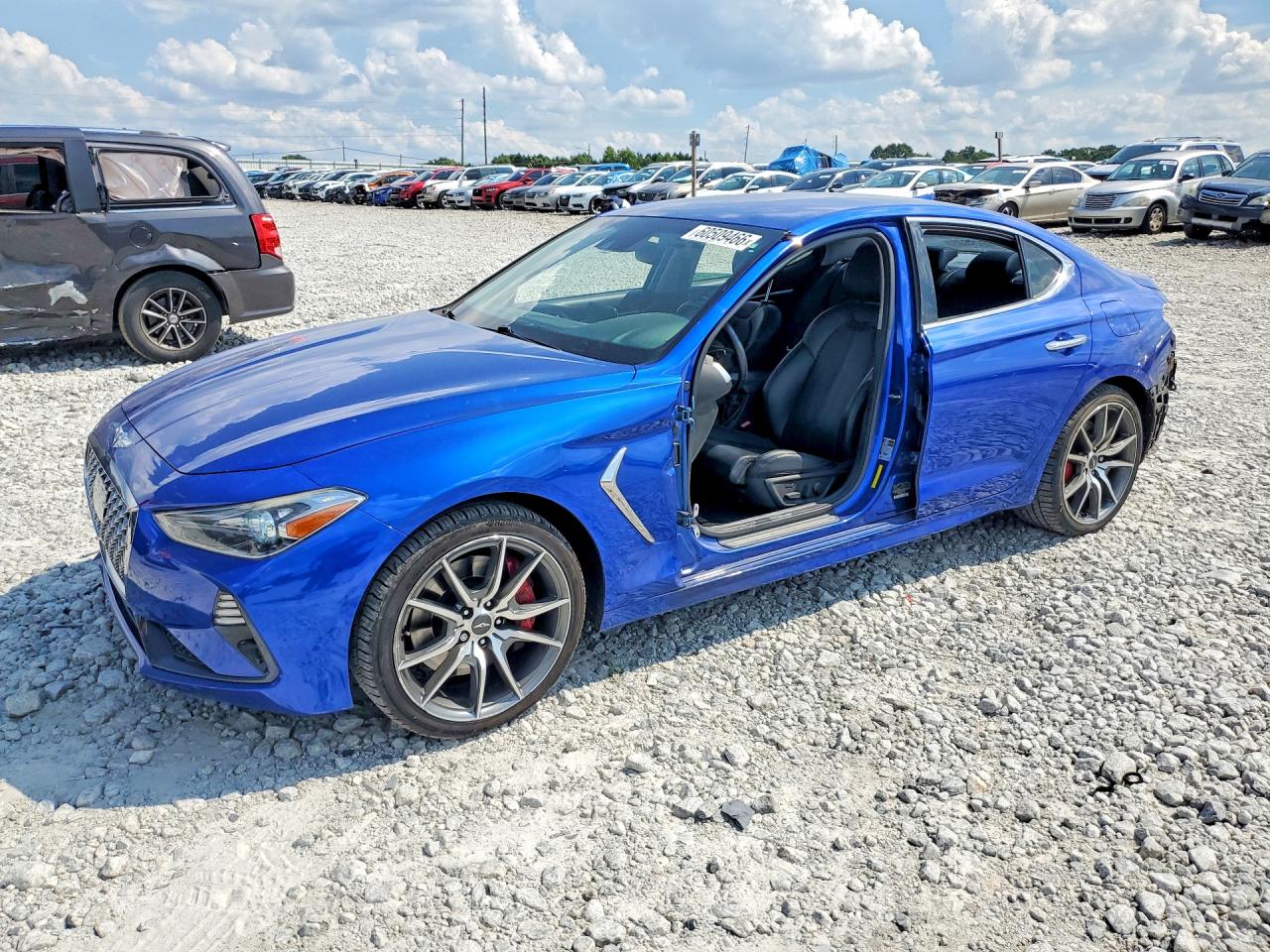 2019 Genesis G70 Sport, VIN KMTG24LA4KU016543 — Side