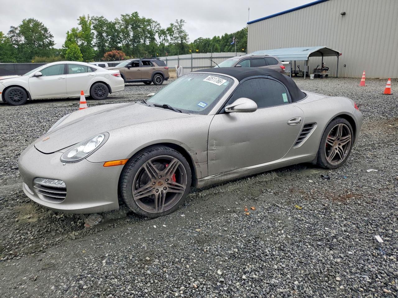 2012 Porsche Boxster S, VIN WP0CB2A85CS730115 — Бок