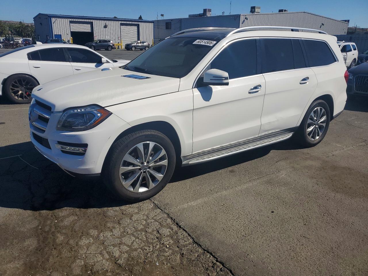 2015 Mercedes-Benz GL 450, VIN 4JGDF6EE8FA475689 — Minor dents and scratches