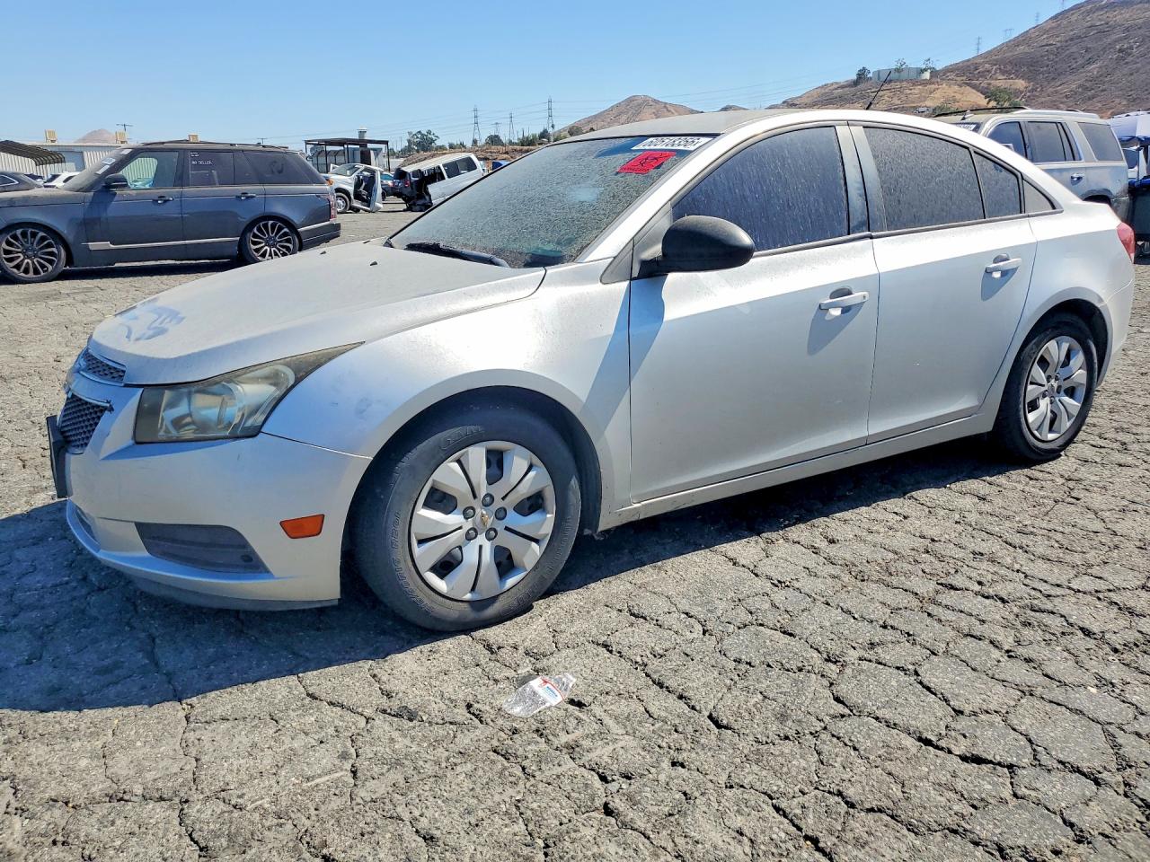 2014 Chevrolet Cruze LS, VIN 1G1PA5SG8E7256199 — Minor dents and scratches