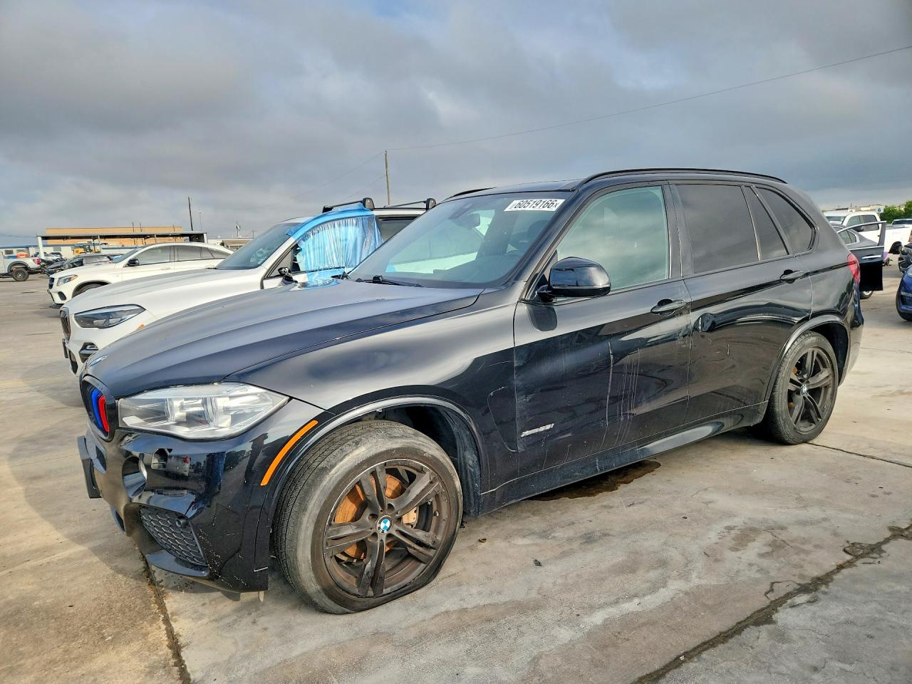 2015 BMW X5 xDrive35i, VIN 5UXKR0C56F0K56981 — Side