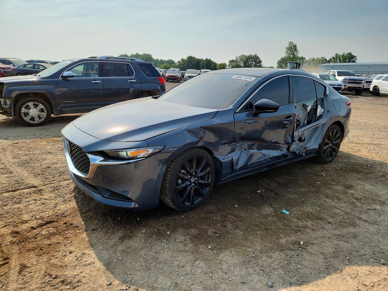 2023 Mazda 3 S Carbon Edition, VIN 3MZBPACM1PM380527 — Side