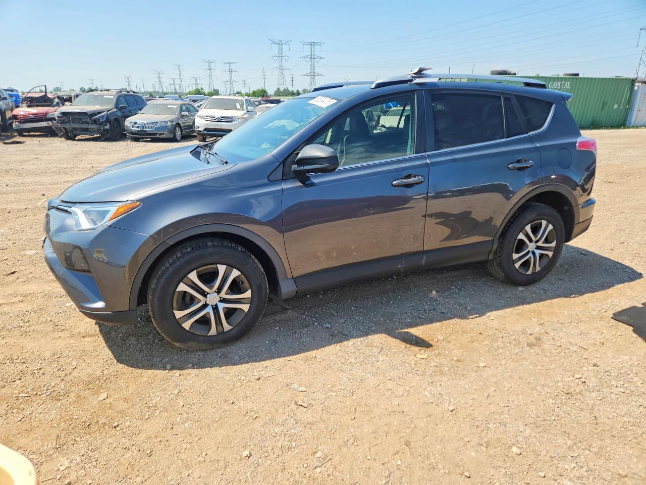 2016 Toyota RAV4 LE, VIN JTMBFREV3GD182022 — Front end