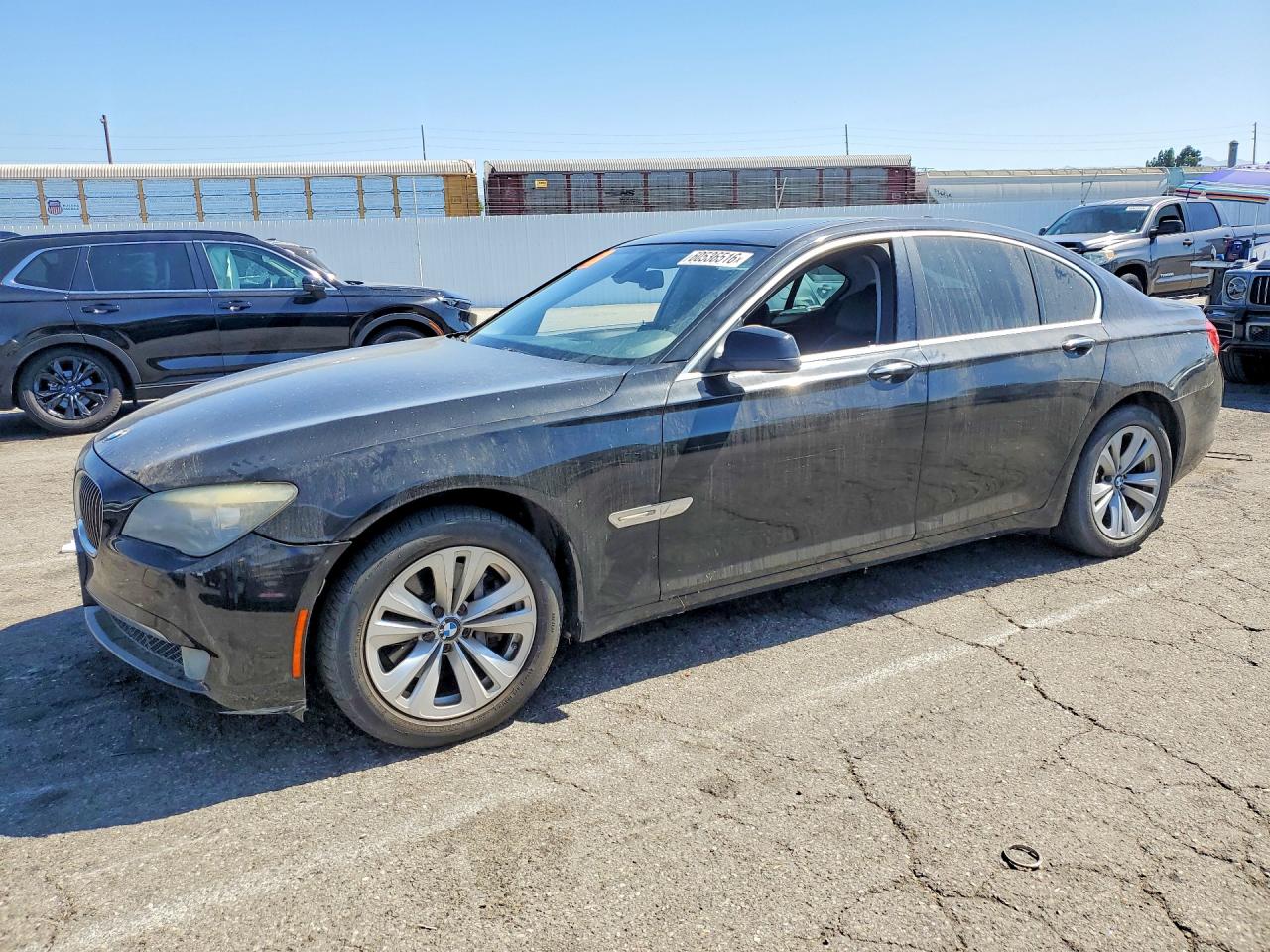 2011 BMW 7 Series 740i, VIN WBAKA4C52BC392241 — Minor dents and scratches