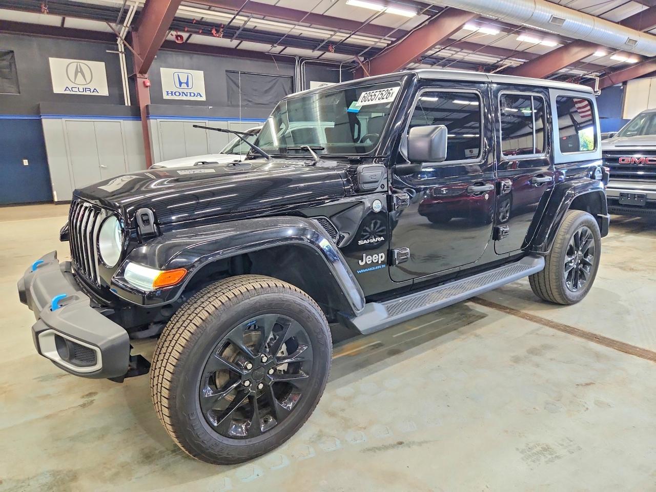 2023 Jeep Wrangler Sahara, VIN 1C4JJXP62PW502620 — Minor dents and scratches