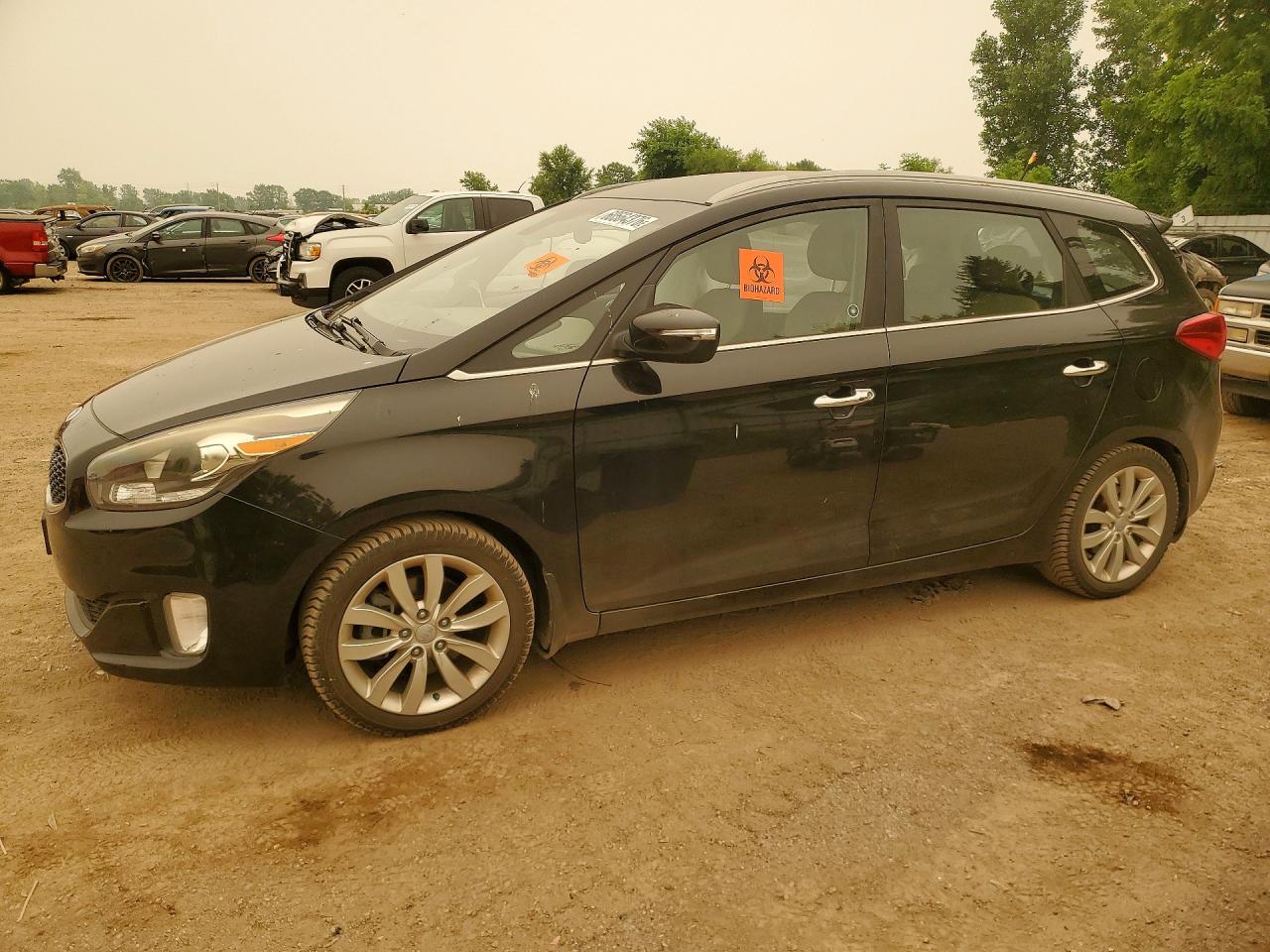 2015 Kia Rondo EX, VIN KNAHU8A35F7122722 — Side