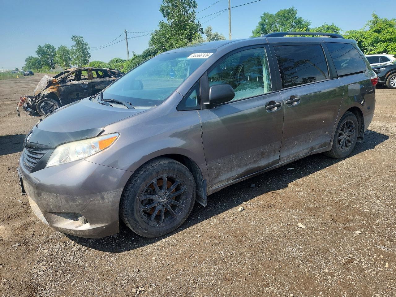 2015 Toyota Sienna L, VIN 5TDZK3DCXFS622697 — Water / flood