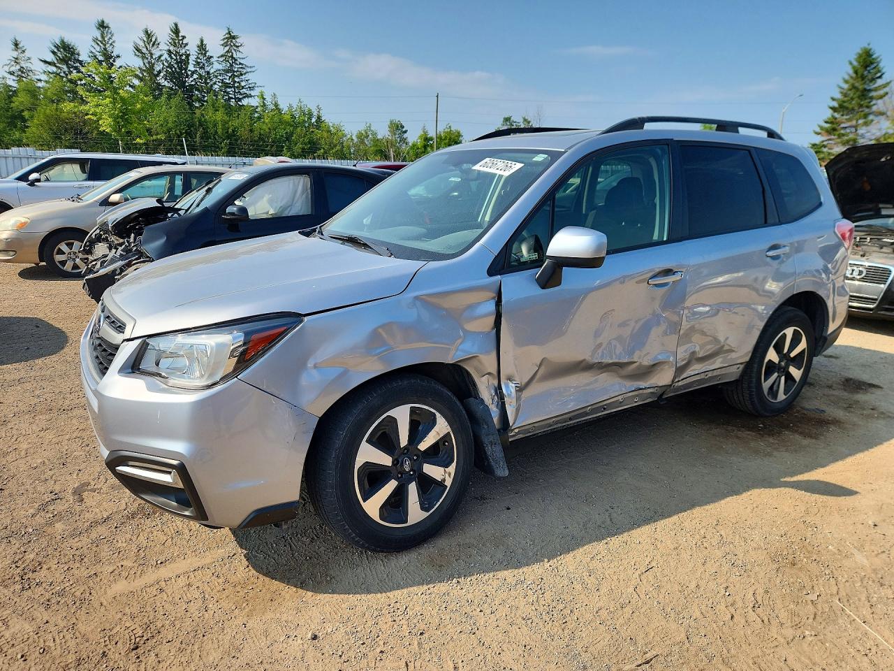 2017 Subaru Forester i Touring, VIN JF2SJEJC7HH532842 — Side