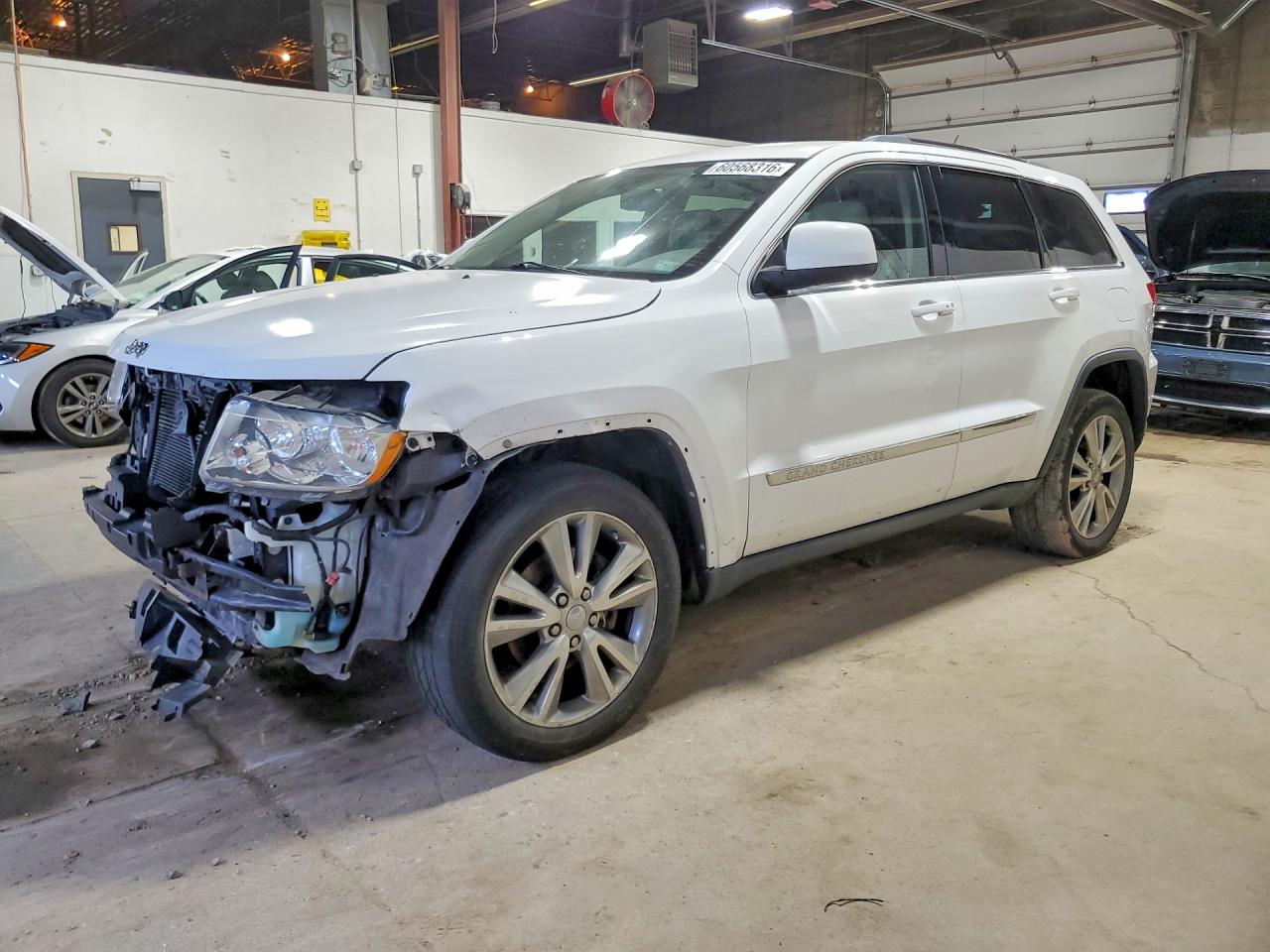 2013 Jeep Grand Cherokee Laredo, VIN 1C4RJFAGXDC549115 — Front end