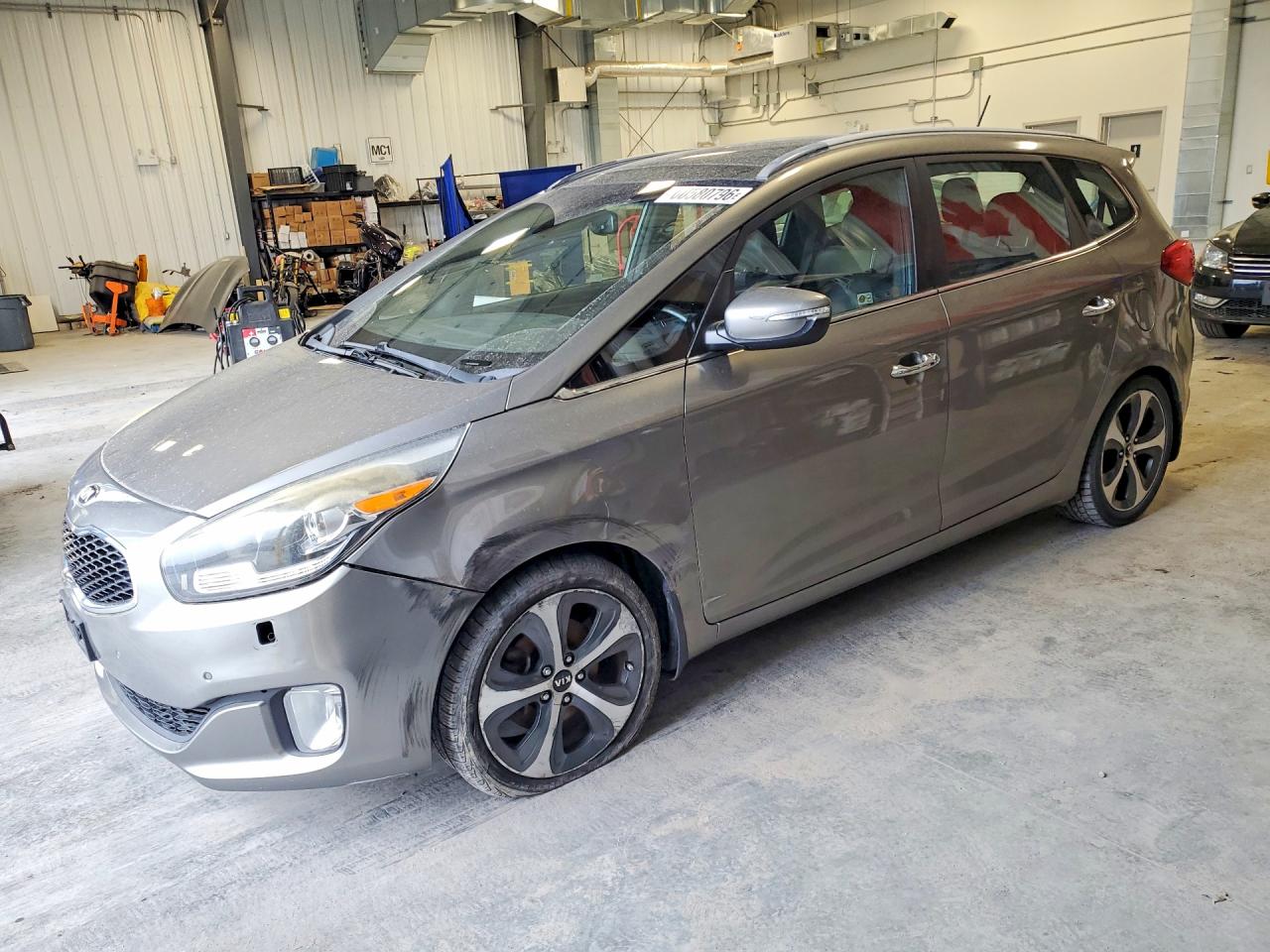 2014 Kia Rondo EX, VIN KNAHU8A36E7020280 — Side