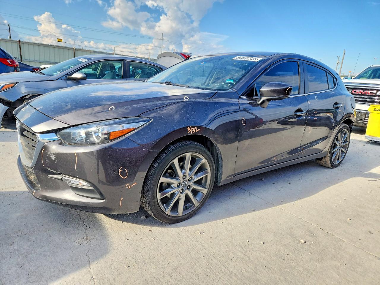 2018 Mazda 3 Touring, VIN 3MZBN1L38JM261443 — Rear end
