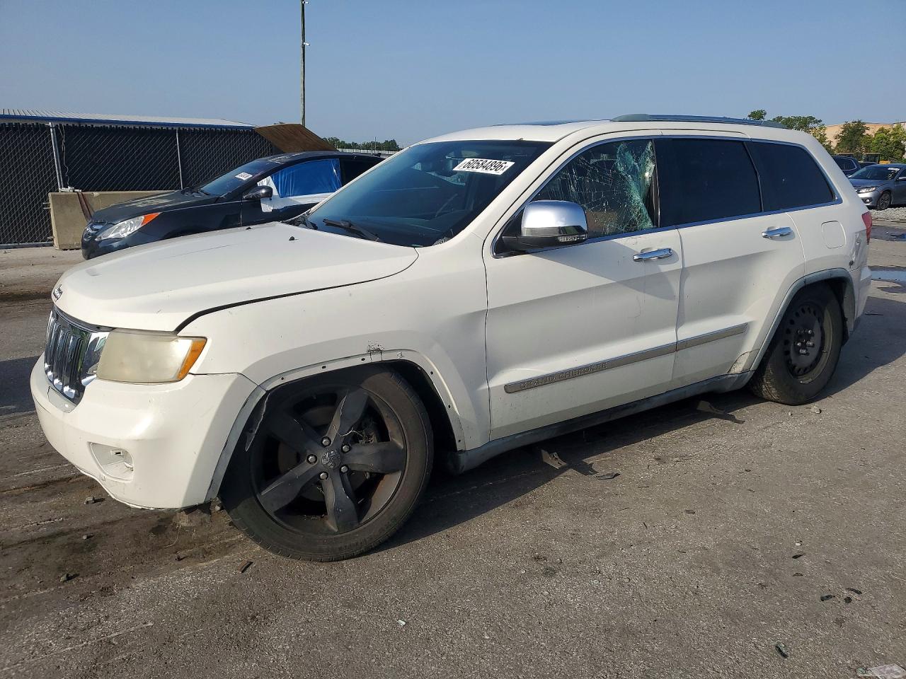 2011 Jeep Grand Cherokee Overland, VIN 1J4RR6GT4BC600998 — Vandalism
