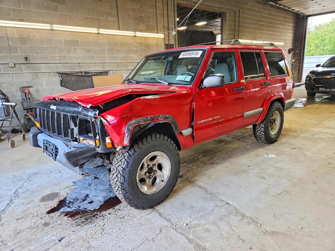 2001 Jeep Cherokee Sport, VIN 1J4FF48S81L576385 — Side