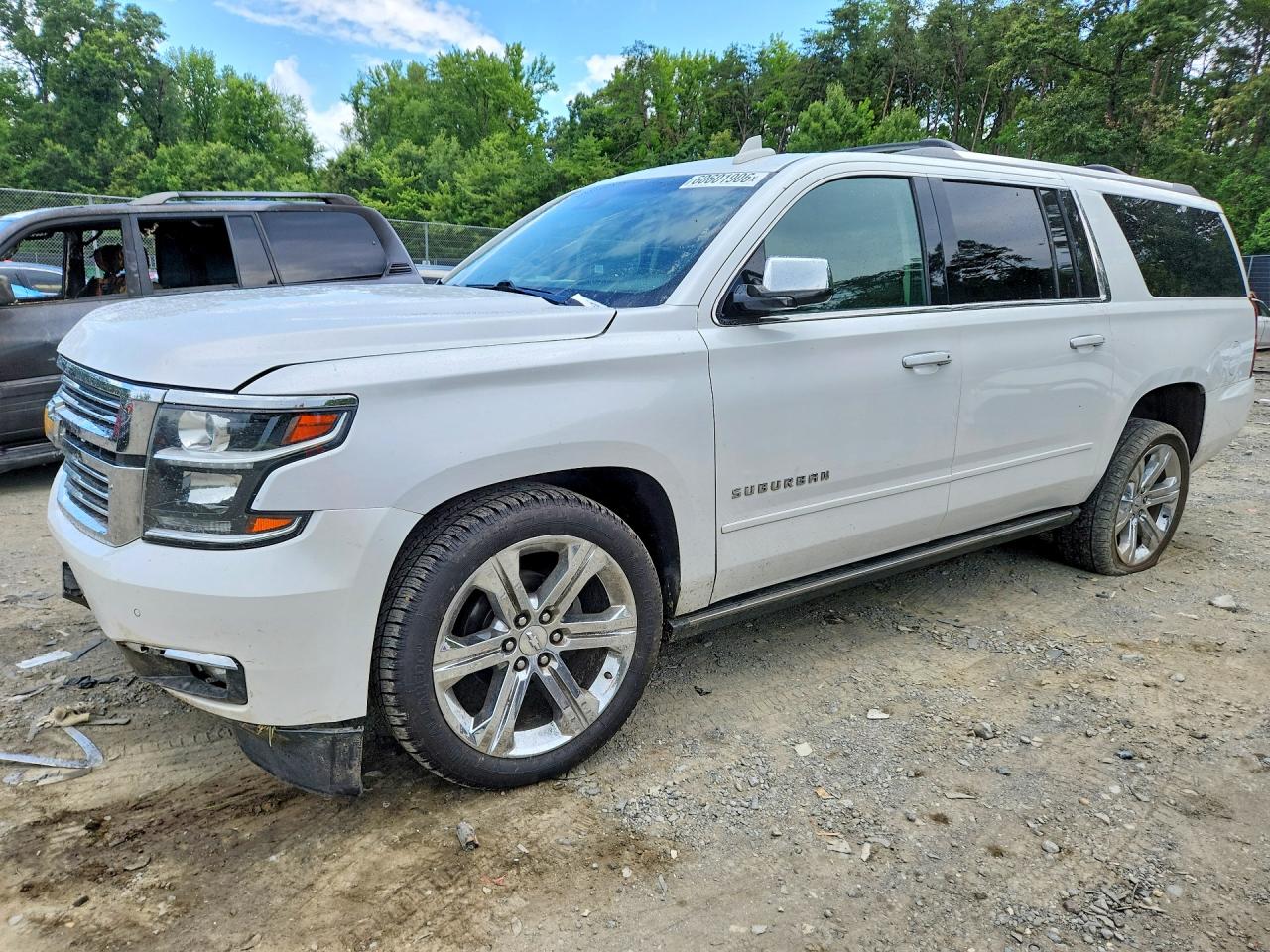 2017 Chevrolet Suburban Premier, VIN 1GNSKJKC7HR169785 — Front end