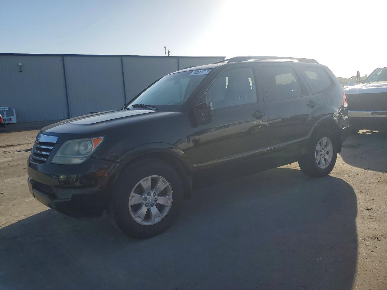 2009 Kia Borrego EX, VIN KNDJJ741195023638 — Бок
