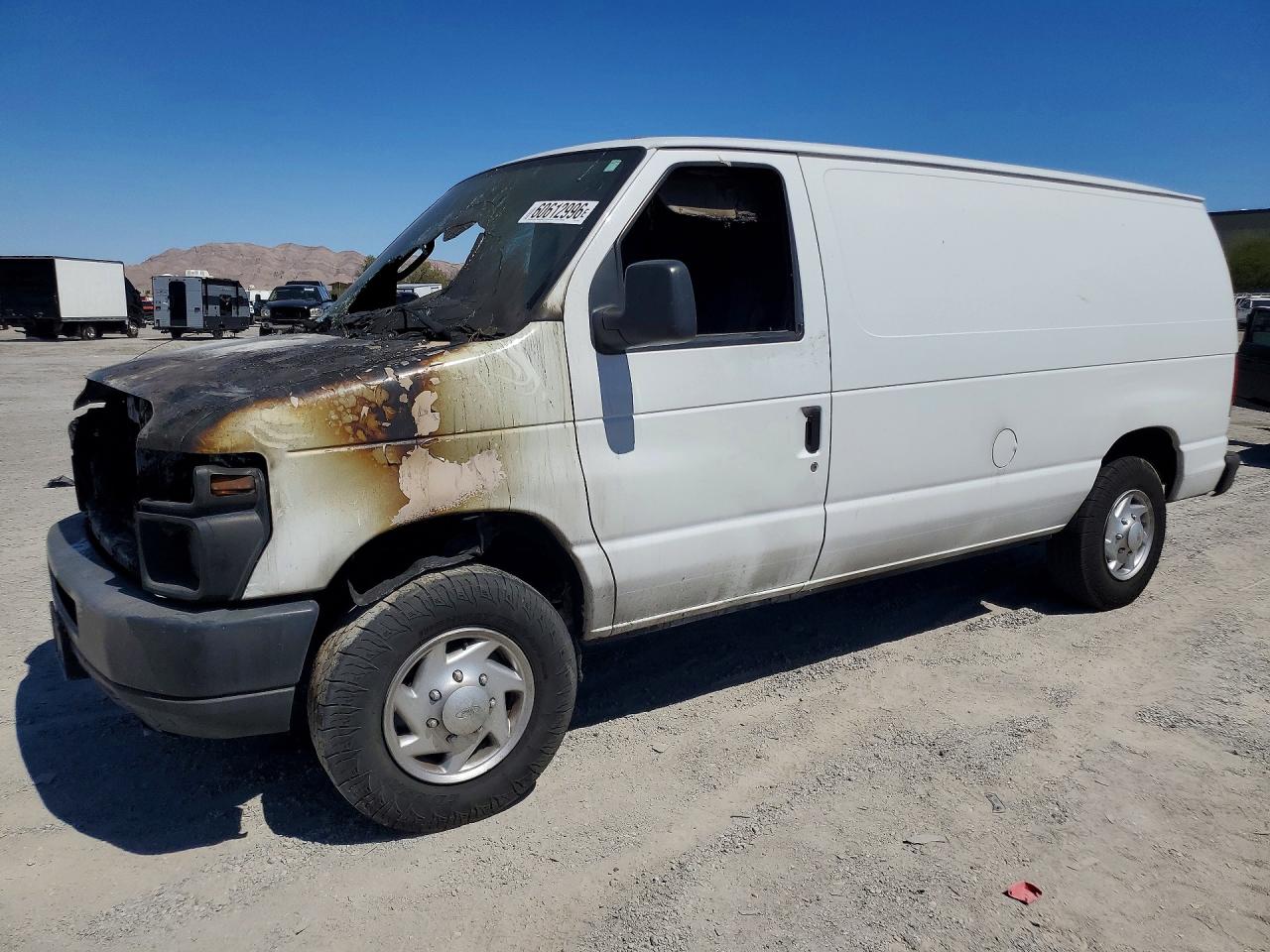 2013 Ford Econoline Cargo Commercial, VIN 1FTNE1EW3DDB28306 — Vandalism