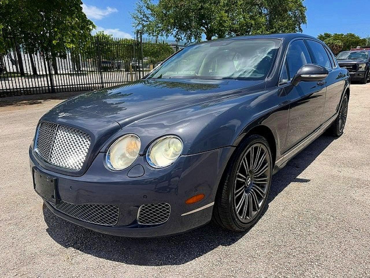 2013 Bentley Continental GT, VIN SCBBP9ZA4DC081659 — Side