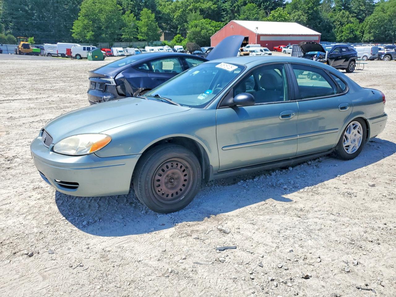 2006 Ford Taurus SE, VIN 1FAFP53U86A194822 — Side