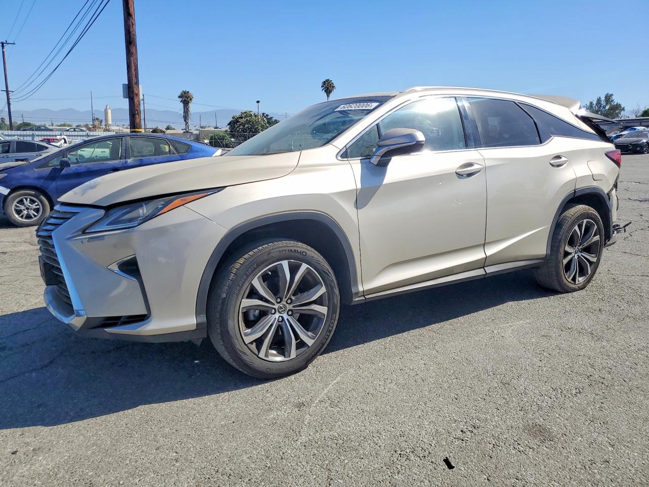 2018 Lexus RX 350L Premium, VIN JTJGZKCA8J2009181 — Зад