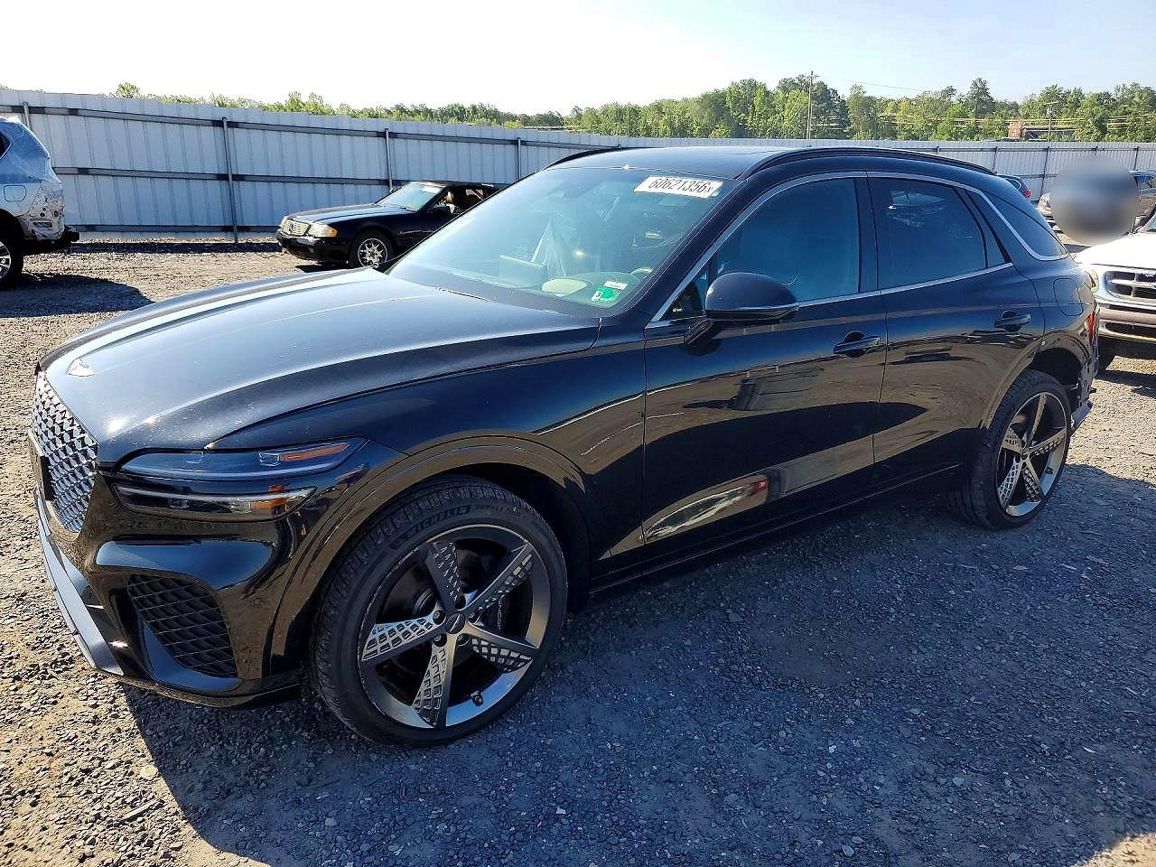 2022 Genesis GV70 Sport, VIN KMUMCDTC4NU021985 — Rear end