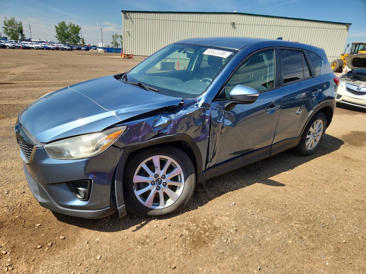 2015 Mazda CX-5 Touring, VIN JM3KE4CY5F0500402 — Бок