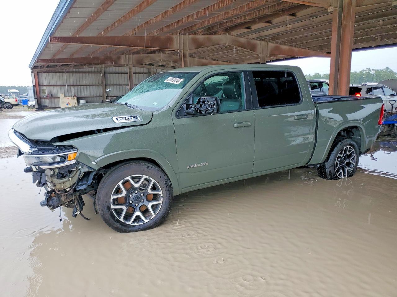 2026 Ram 1500 Laramie, VIN 1C6SRFJP5TN255707 — Front end