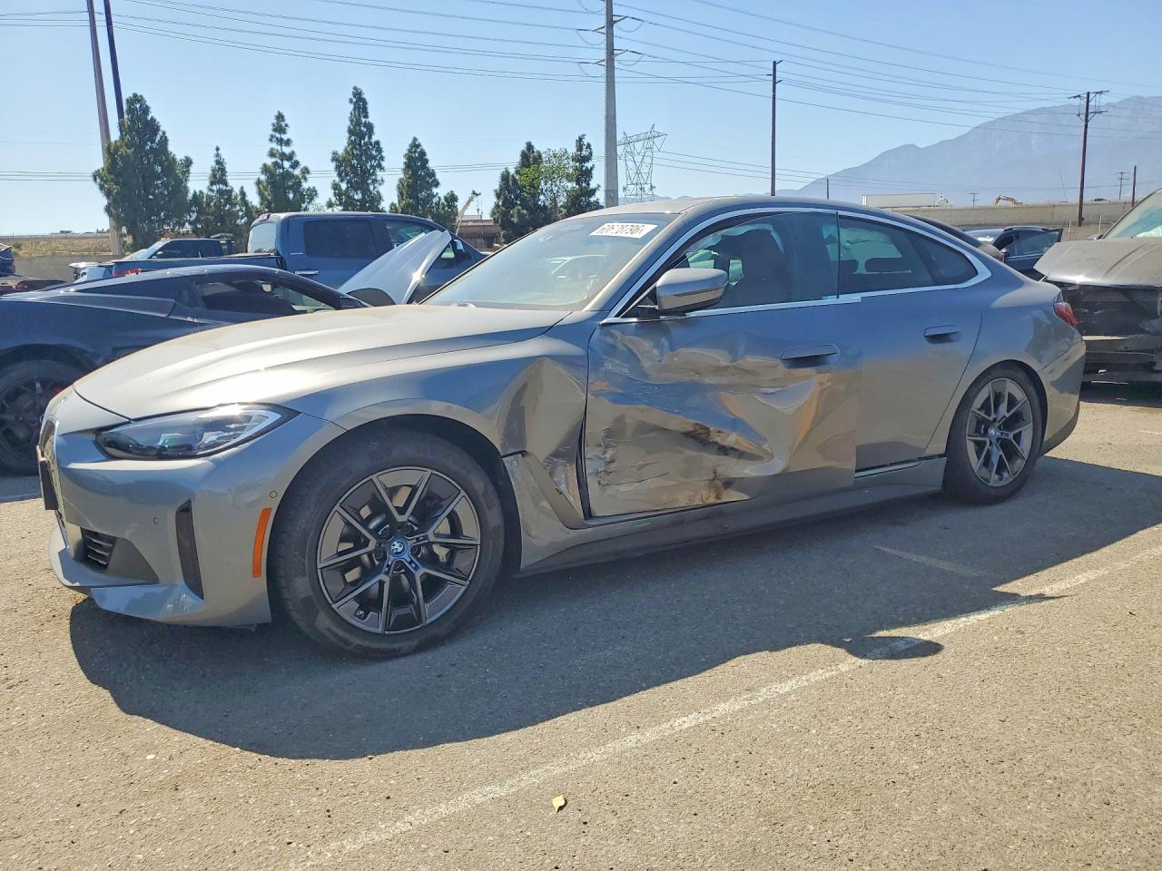 2024 BMW i4 eDrive35, VIN WBY43AW00RFS09950 — Side