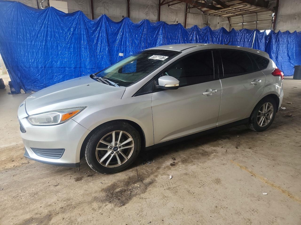 2015 Ford Focus SE, VIN 1FADP3K20FL223147 — Normal wear