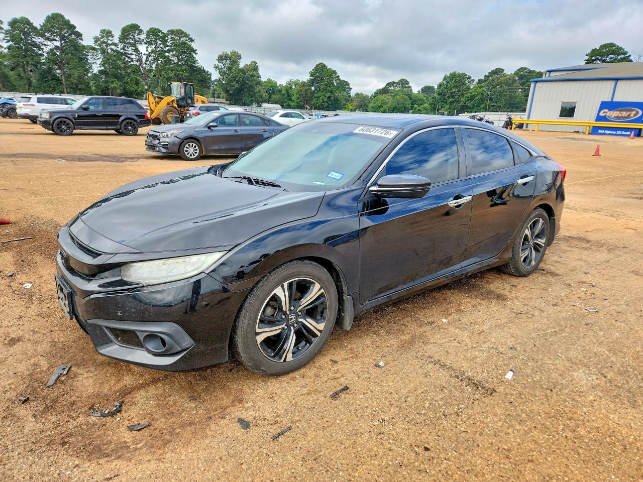 2017 Honda Civic Touring, VIN 19XFC1F9XHE000555 — Бок