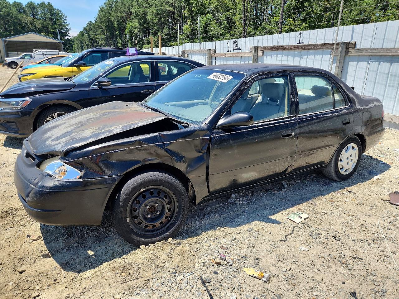 1999 Toyota Corolla CE, VIN 2T1BR12E3XC156563 — Front end