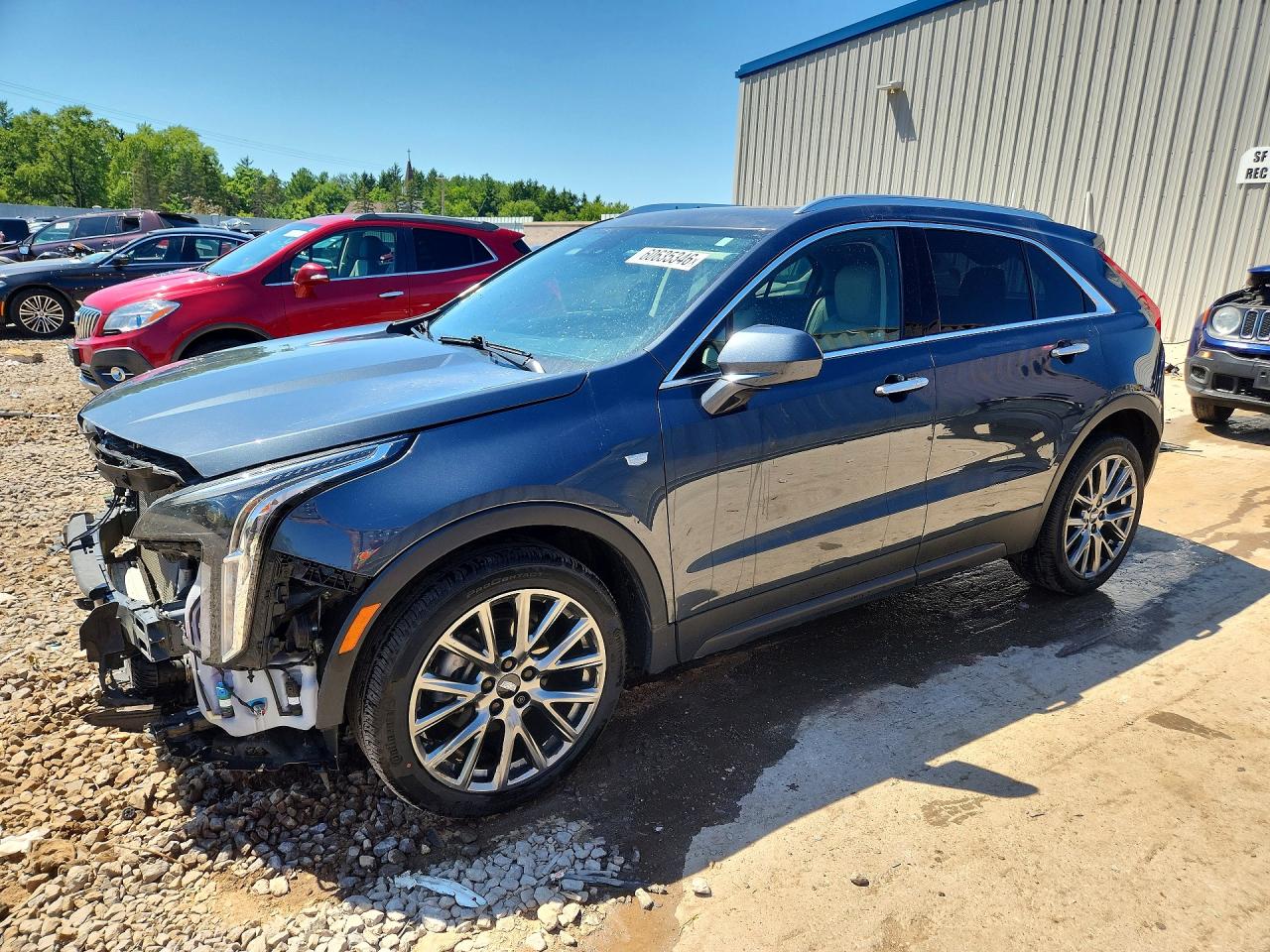 2021 Cadillac XT4 AWD Luxury, VIN 1GYFZBR41MF026220 — Перед