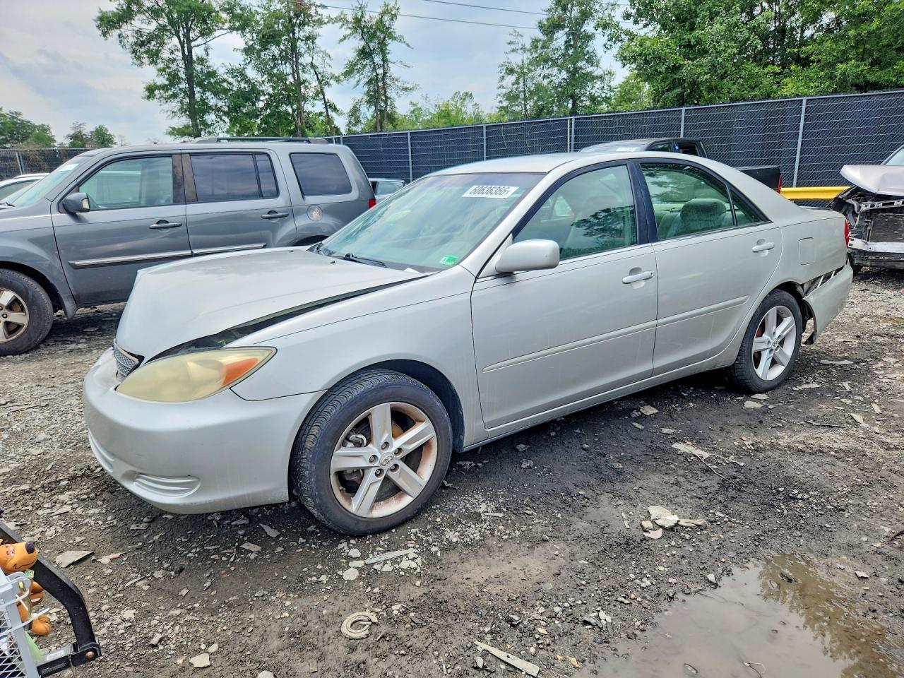 2004 Toyota Camry LE, VIN 4T1BE32K14U842155 — Rear end