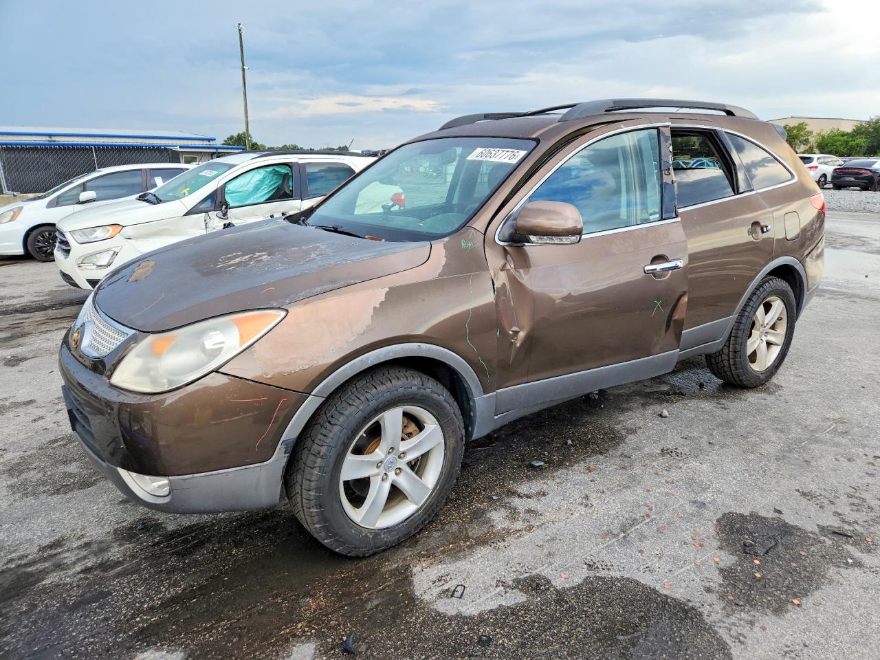 2011 Hyundai Veracruz Limited, VIN KM8NU4CC4BU149896 — Side