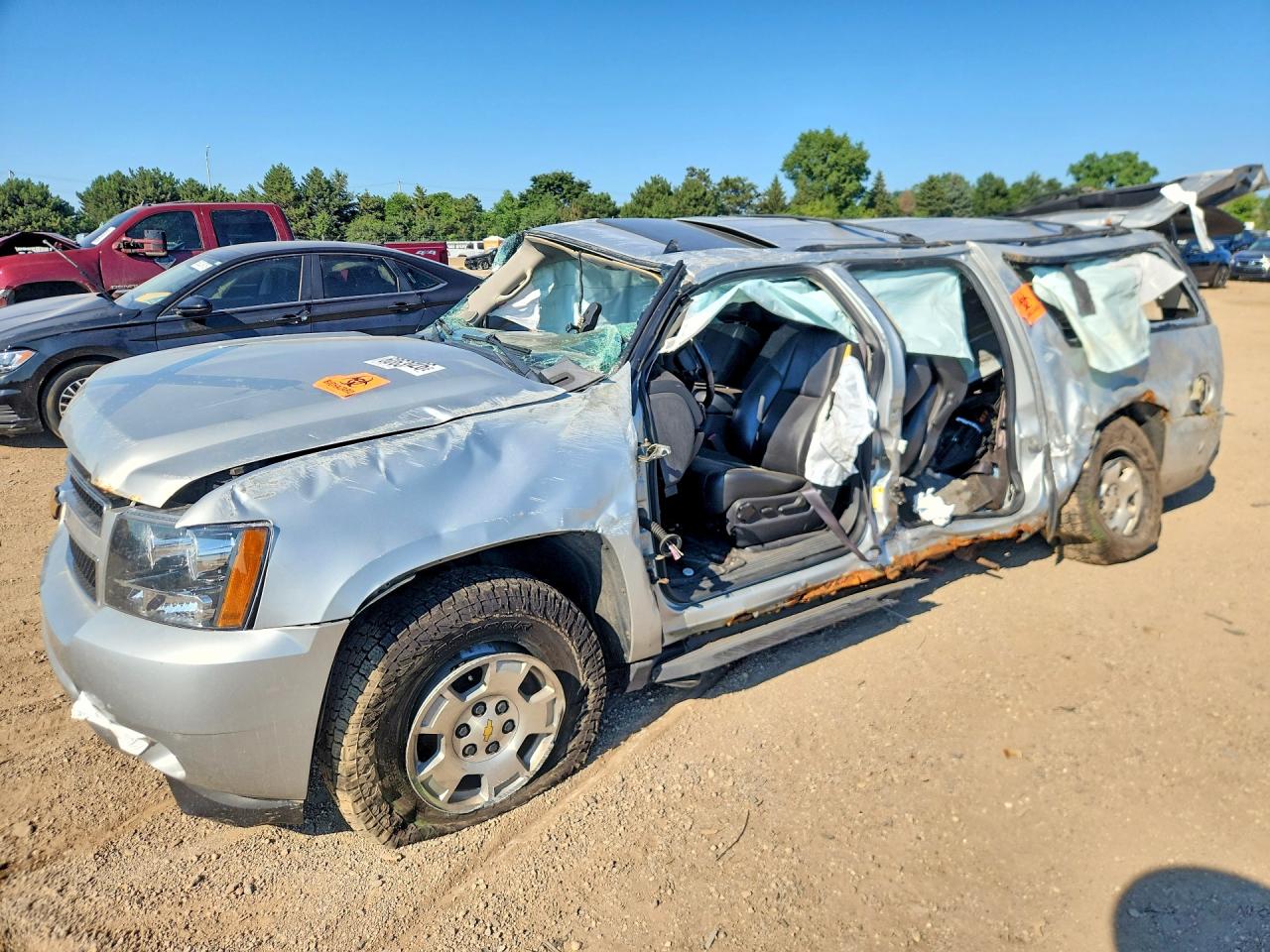 2013 Chevrolet Suburban LT, VIN 1GNSKJE74DR231846 — Rollover