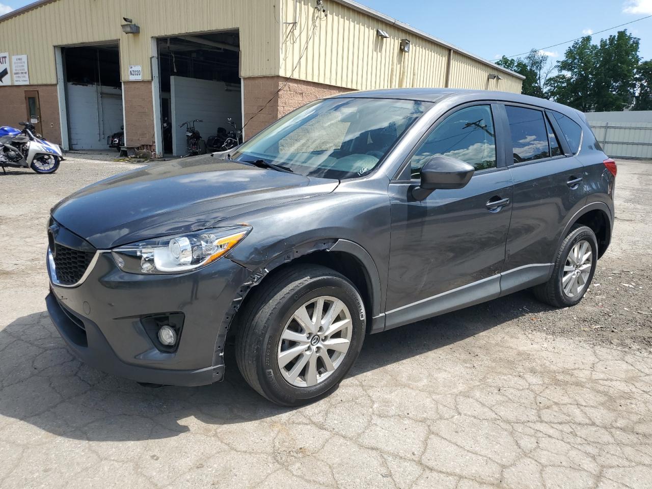 2014 Mazda CX-5 Touring, VIN JM3KE4CY3E0422930 — Vandalism
