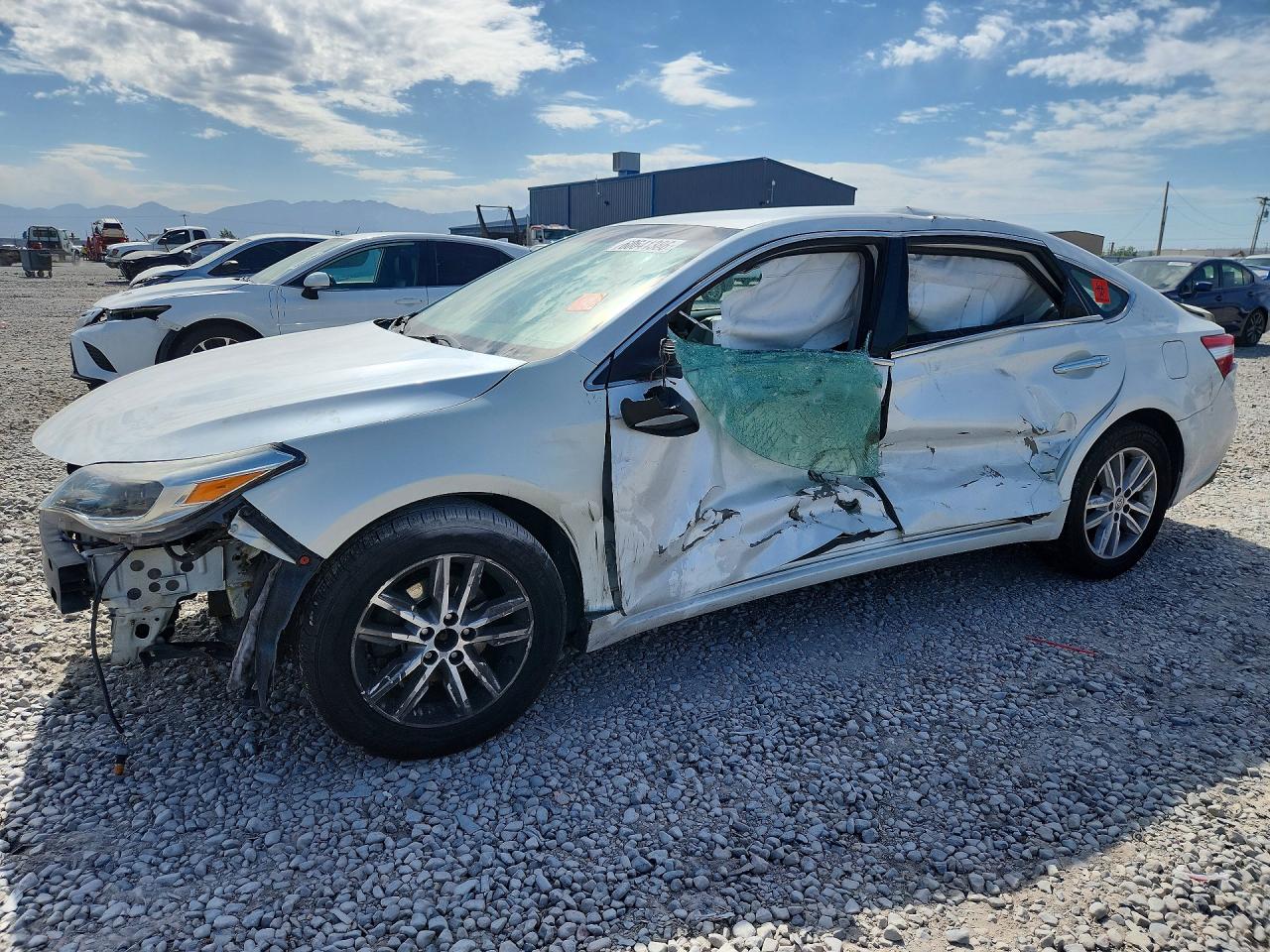 2013 Toyota Avalon XLE Touring, VIN 4T1BK1EB1DU052203 — Side