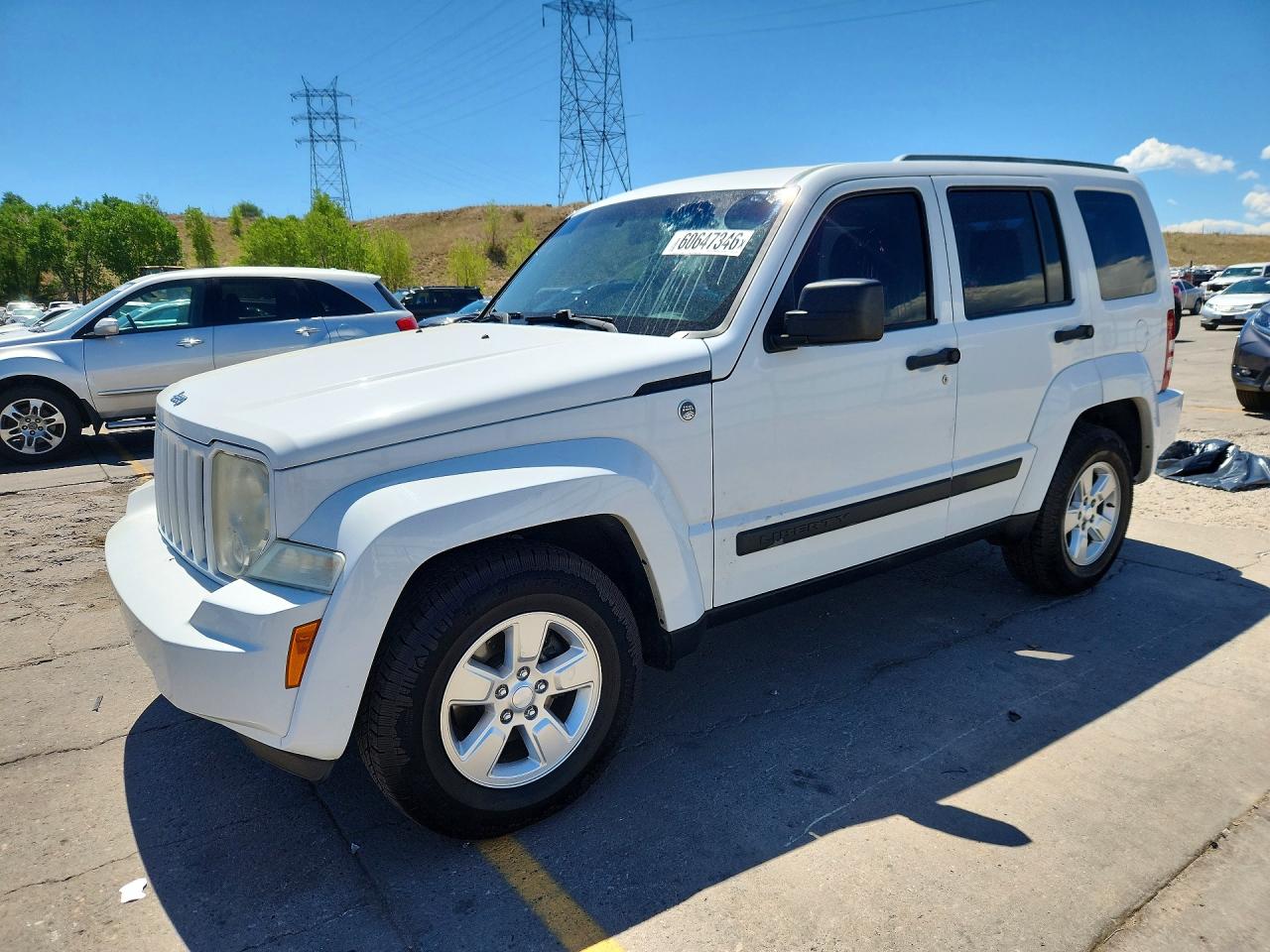2011 Jeep Liberty Sport, VIN 1J4PN2GK4BW553800 — Мелкие вмятины и царапины