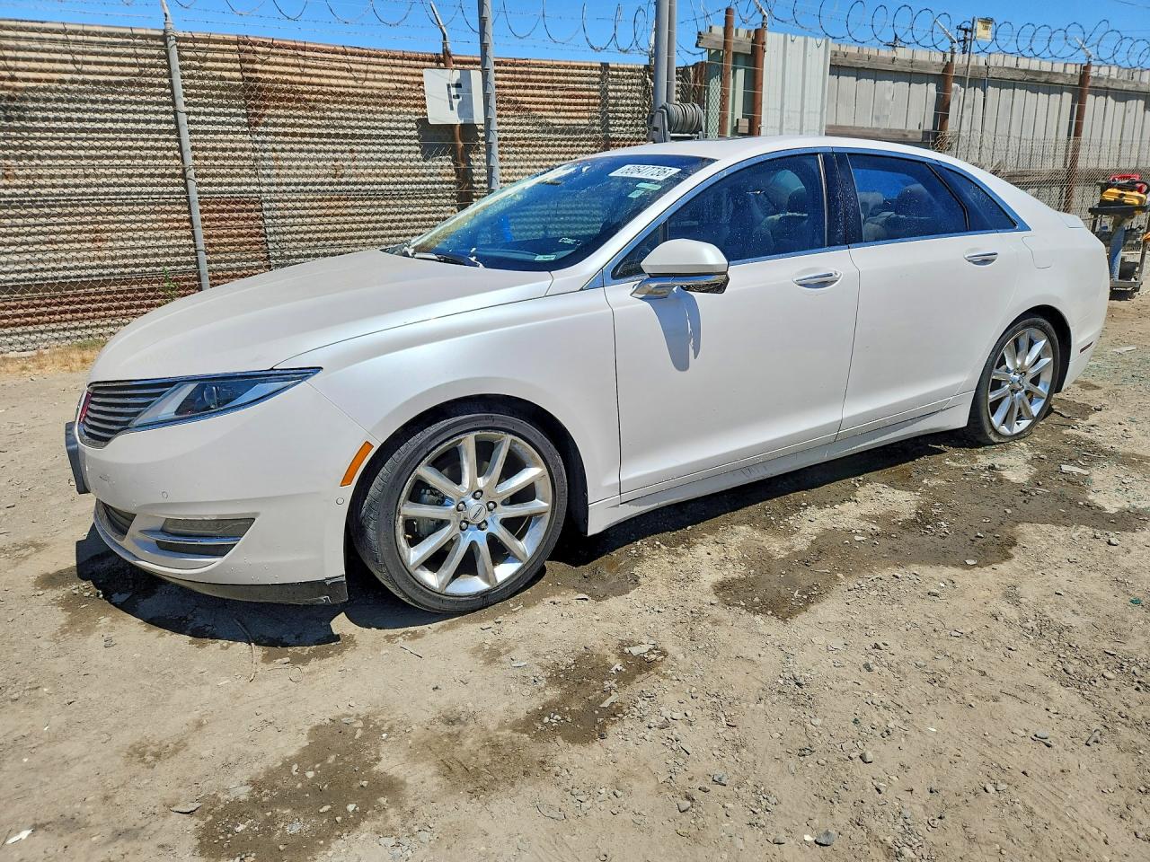 2015 Lincoln MKZ Hybrid, VIN 3LN6L2LU7FR604872 — Vandalism